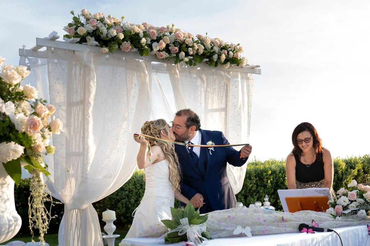 The Infinity Knot Ritual Symbolizes the Newly Sealed Bond Between Spouses The Infinity Knot Ritual Symbolizes the Newly Sealed Bond Between Spouses